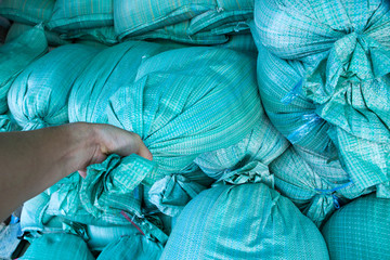 Closeup of green sandbags