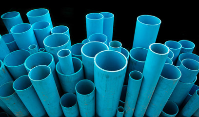 Many size of blue plastic pipes PVC in store.