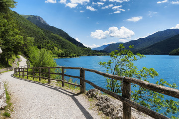 Mountain Ledro lake and his bike path in the Italian Dolomites