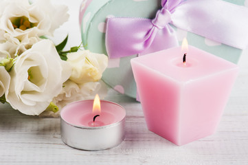 Arrangement of white eustoma flowers, gift boxes