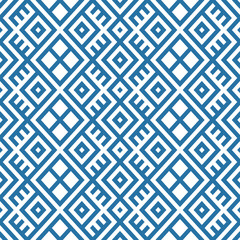 geometric seamless ethnic pattern background in blue and white colors
