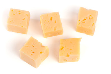 cheese cut into cubes isolated on white background