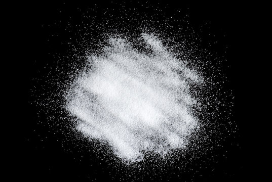 Crystals of salt isolated on black background