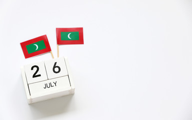 July 26 Wooden calendar Concept independence day of Maldives and Maldives national day.Copy space,minimal style