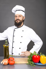 Young chef in uniform ready to cook