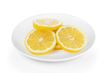 Fresh lemon slices in plate on white background