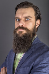 Confident business man with arms folded