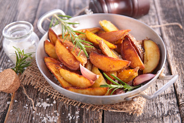 fried potato with rosemary and salt