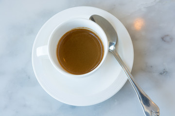 Espresso coffee cup on marble table