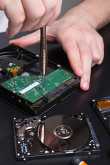 Naklejka premium Hard disc drive disassembling close up