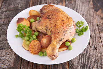 grilled duck leg with potatoes