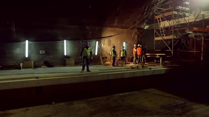 Workers in tunnel