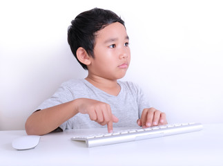 Young boy working on computer