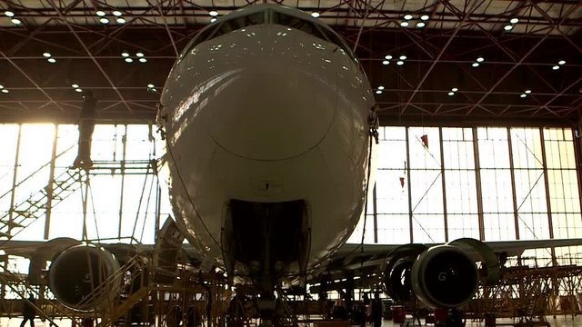 Airplane nose in hanger