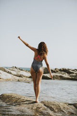 Pretty young woman on the beach