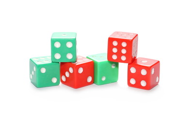 Red and green gambling dice isolated on white background
