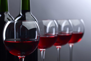 Bottles and glasses of red wine