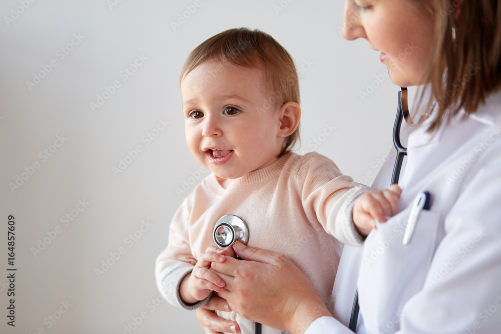 Poster doctor with stethoscope listening baby at clinic