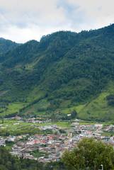 Fototapeta na wymiar Mountains crops and deforestation Guatemala, Baja Verapaz, urban and rural Tactic village.