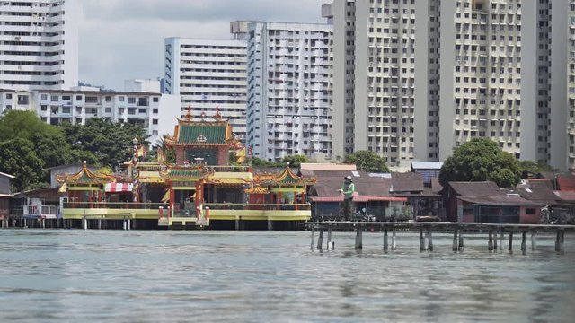 Fisherman in front of Hean Boo Thean Kuan Yin Temple