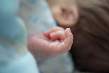 New born's finger. using as health care concept