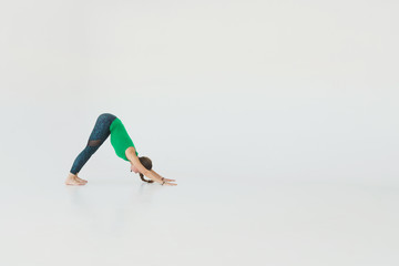 Young attractive woman practicing yoga. Young beautiful woman practicing yoga and gymnastic....