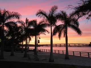 Sun setting at River walk along the Manatee River in Bradenton Florida - 164863836