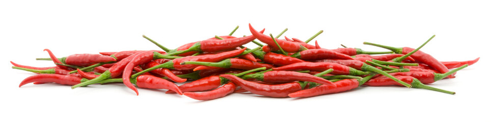 Stack of hot chili pepper or small chili padi, isolated on white background