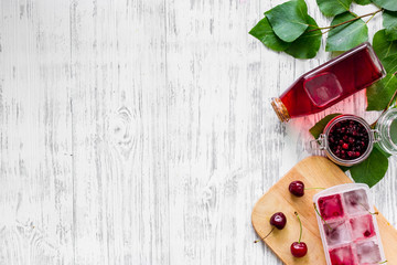 Cranberry morse on wooden table background top view copyspace