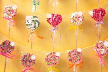 Different lollipops on showcase at candy shop