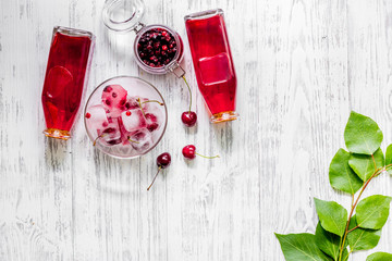Ice cranberry morse on wooden table top view copyspace