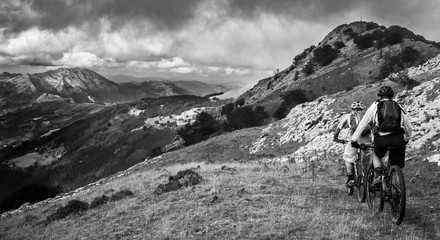 Basque mountain biking - 2 riders heading towards the mountains