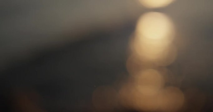 Rack focus tilt up, scenic Yi Sun-Sin Bridge at sunset