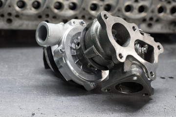 new turbine car engine on a metal background