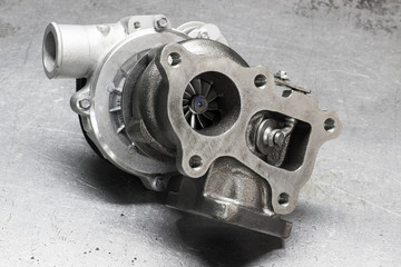 new turbine car engine on a metal background