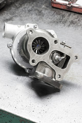 new turbine car engine on a metal background