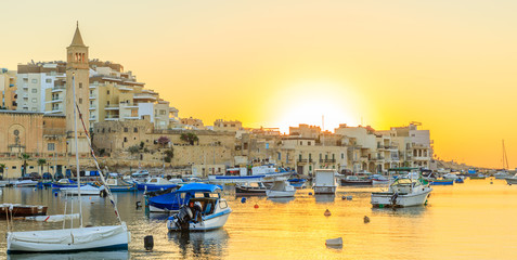 View to marina with boats from waterfront in the morning, Malta