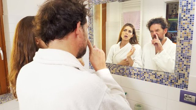 Woman angry husband picking booger from nose funny comedy slow motion