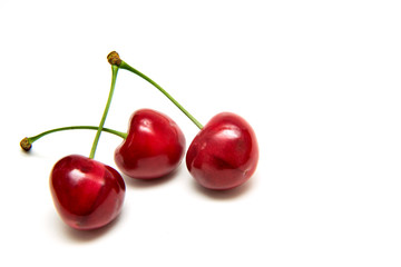 Heart shaped cherry berries isolated on white background cutout