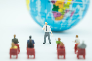 Business , planning and meeting concept. Businessman miniature figure standing and present in front...