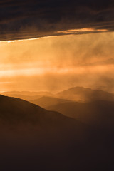 golden hour over some coastal mountains