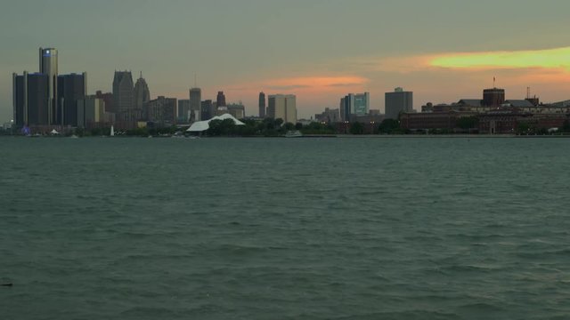 View of the Detroit skyline during the sunset from the water - Tilt Up