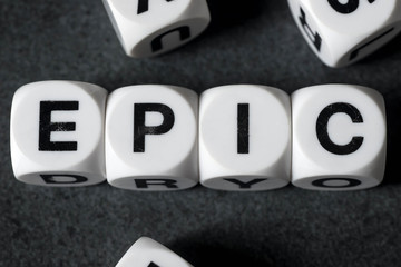 word epic on toy cubes