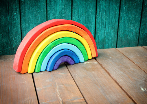 Wooden eco toy - rainbow puzzle.