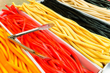 Long snake sweets on sale at a market stall
