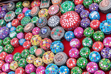 Small, decorated, multicoloured trinket jewellry boxes.