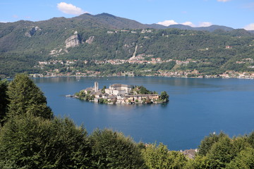 Fototapeta na wymiar Island of San Giulio at Lake Orta in summer, Piedmont Italy 