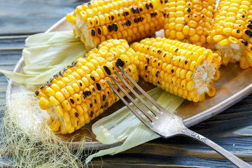 Sweet corn grilled with salt. © Saprunova Marina