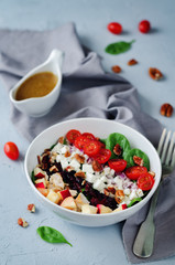 Chicken spinach apple tomato goat cheese salad