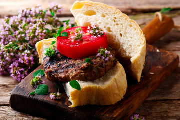 Grilled herbed burger.style rustic .selective focus
